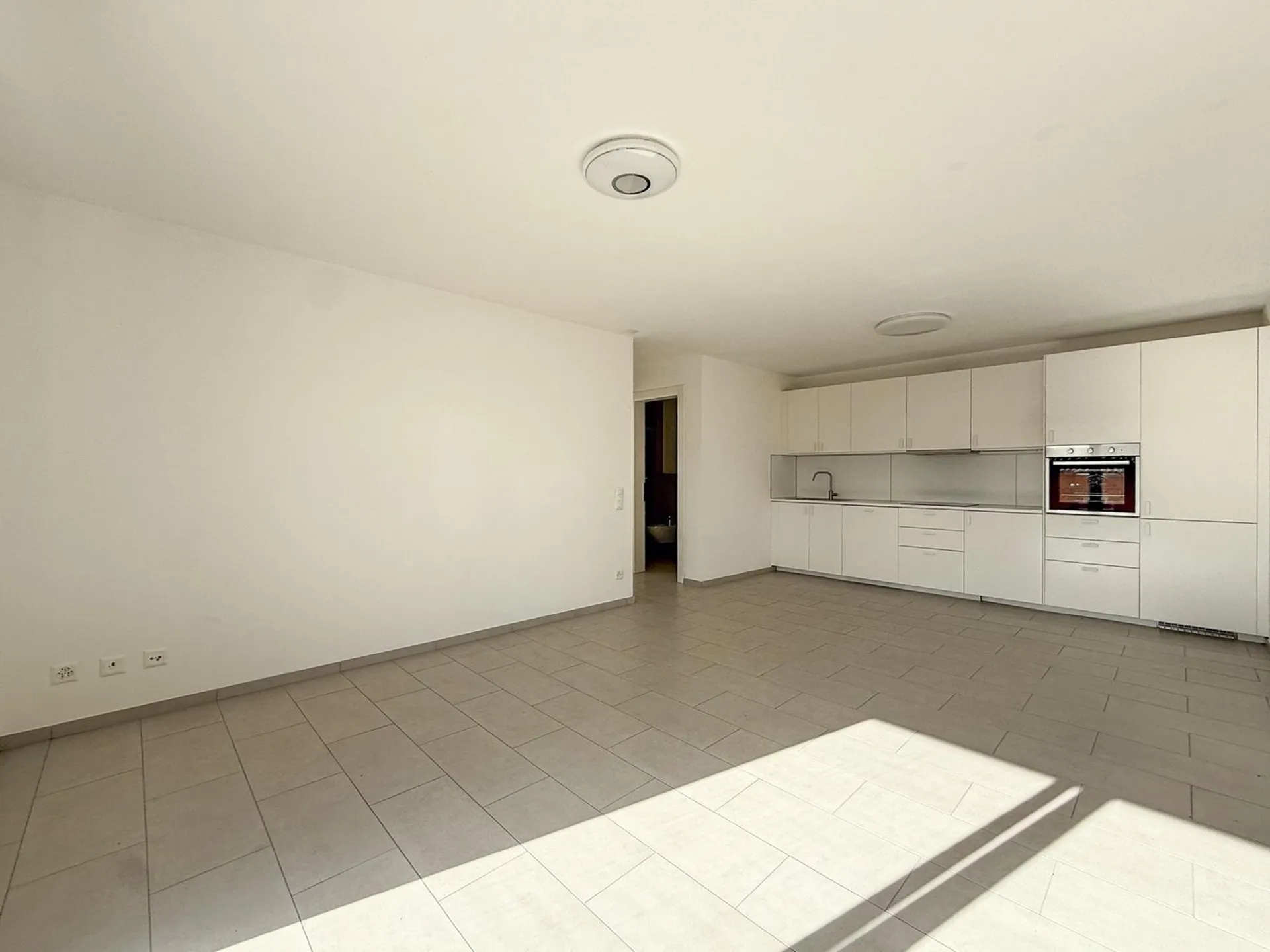 Moderno appartamento 2.5 locali con giardino a Vernate