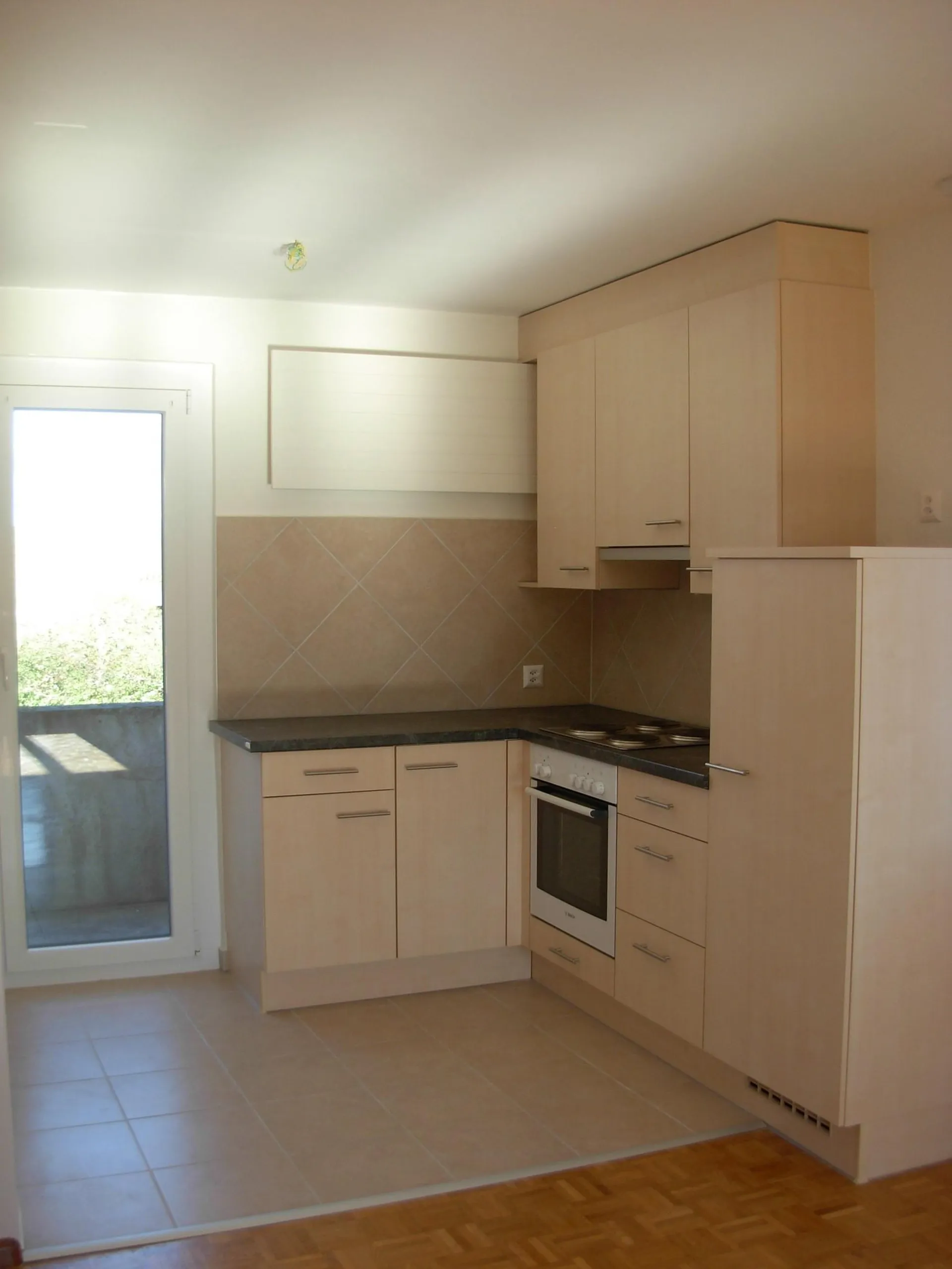 Appartement 4 pièces avec balcons et garage à Val-de-Ruz