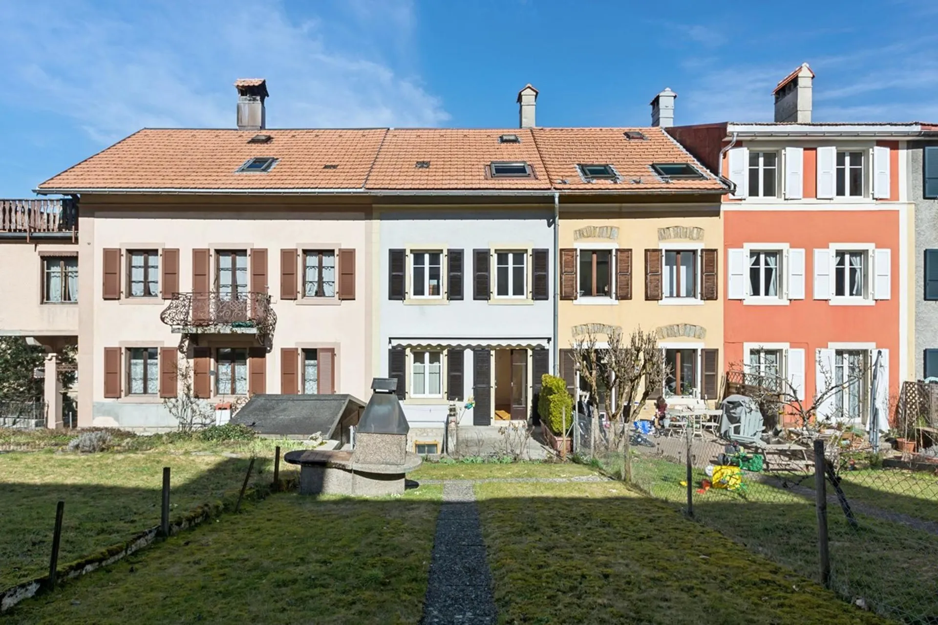 Maison mitoyenne avec joli potentiel de rénovation