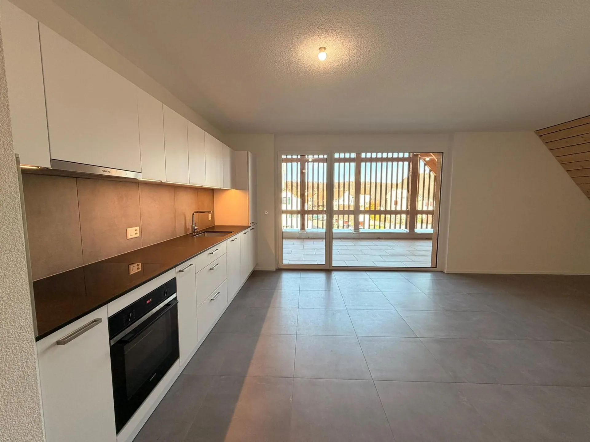 Appartement neuf de 3.5 pièces à Coeuve avec très grand balcon