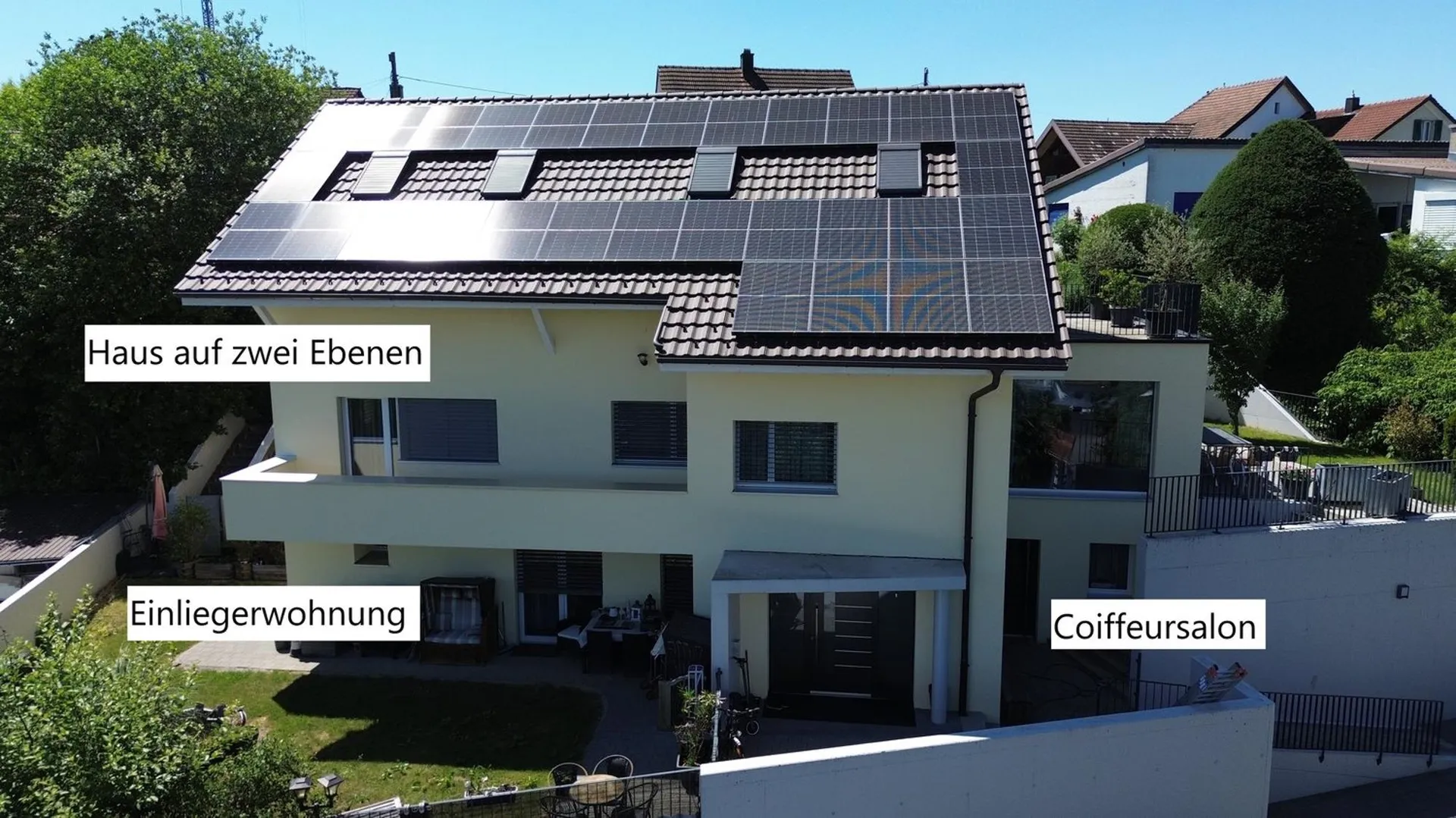 Exklusives Einfamilienhaus  mit Einliegerwohnung an ruhiger Hanglange.