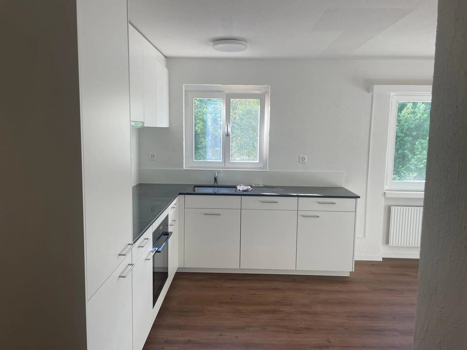 Gemütliche 2-Zimmer-Wohnung mit Gartensitzplatz in Malix – sofort verfügbar